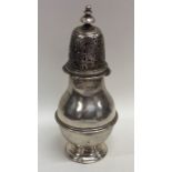 An Edwardian baluster shaped silver caster. London