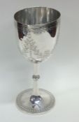 A small Edwardian silver goblet with floral decora
