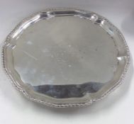 An attractive Georgian silver salver with gadroon