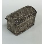A silver embossed dome top casket with gilt interi