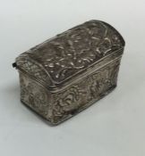 A silver embossed dome top casket with gilt interi