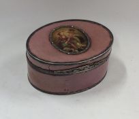 An oval Antique pink enamelled box with marcasite