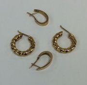 Two pairs of 9 carat ear clips. Approx. 7 grams. E