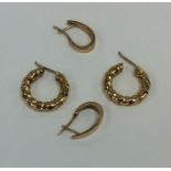 Two pairs of 9 carat ear clips. Approx. 7 grams. E