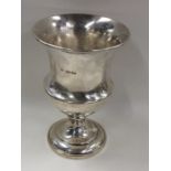 BARNARDS: A tapering silver campana shaped goblet.