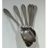 A heavy set of six silver grapefruit spoons. Sheff