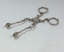 A pair of Georgian silver sugar scissors. Approx.