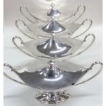 A good set of four Georgian silver sauce tureens o