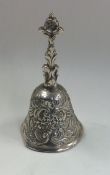 A Dutch silver model of a bell attractively chased