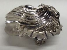 A Georgian silver butter shell with fluted bowl. L