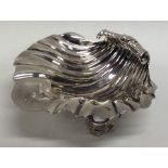 A Georgian silver butter shell with fluted bowl. L