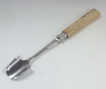 A silver cheese scoop with tapering handle. Sheffi