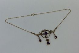 An attractive amethyst and pearl pendant on fine l