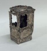 An unusual silver model of a sedan chair inset wit