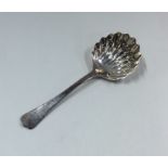 A good silver sifter spoon with fluted bowl. Chest