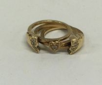 An unusual gold and diamond split ring with hinged