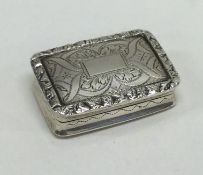 A Georgian silver hinged top vinaigrette with chas