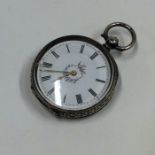 A small Continental silver fob watch with white en