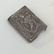A heavy Indian silver vesta case embossed with fig