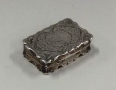 A rectangular hinged top silver vinaigrette decora