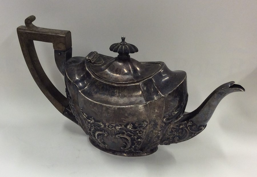 An embossed bachelor's three piece silver teapot. - Image 2 of 2