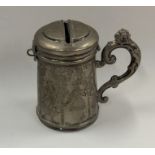 A French novelty silver money box with scroll hand