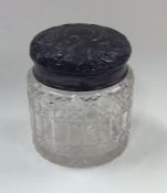 An Edwardian silver hobnail cut dressing table jar