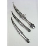 A group of three silver Iraqi daggers with Niello