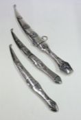 A group of three silver Iraqi daggers with Niello