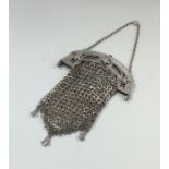 A Dutch silver mesh purse with hinged purse on sus