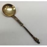 A silver gilt anointing spoon with twisted stem en