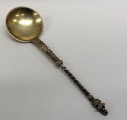 A silver gilt anointing spoon with twisted stem en