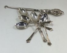 A set of six silver coffee spoons with twisted ter