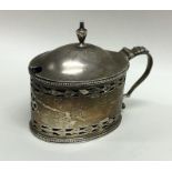 A Georgian silver hinged top mustard pot with brig
