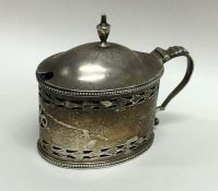 A Georgian silver hinged top mustard pot with brig