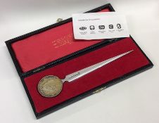 STUART DEVLIN: A cased silver letter opener with Q