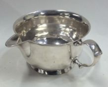 An unusual George II silver invalid cup on spreadi
