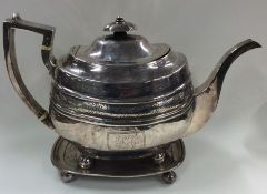 A good Georgian silver bright cut teapot attractiv