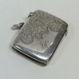 An Edwardian silver engraved vesta case. Birmingha