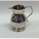 A good Georgian silver sparrow beak cream jug on s