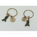 A pair of Chinese gold and jade earrings with carv