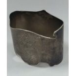 A heavy Russian silver napkin ring decorated with