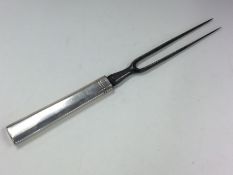 A Continental silver tapering meat fork. Approx. 9