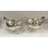 A pair of heavy Irish silver sauce boats with card