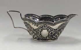 An attractive Edwardian half fluted silver cream j