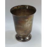 A tall tapering French silver spill vase on spread