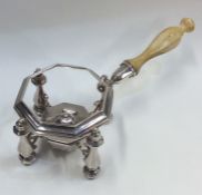 A rare Queen Anne silver mounted kettle stand toge