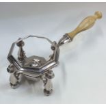 A rare Queen Anne silver mounted kettle stand toge