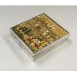 A rectangular ivory and silver cigarette box with
