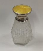 A silver and enamel scent bottle. Approx. 100 gram